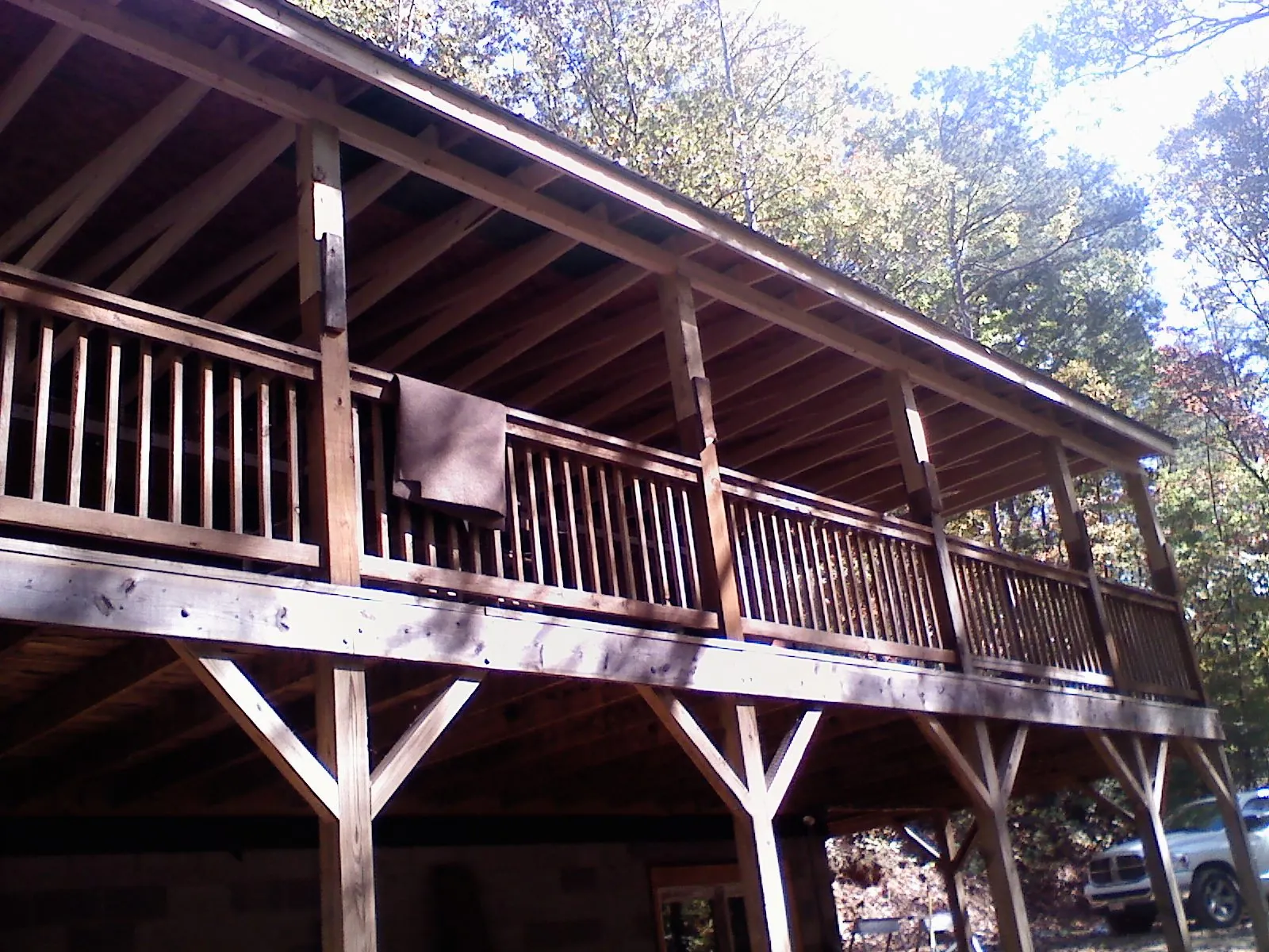 Timber framing under a new elevated porch and deck — Roof Leak Repair in Patricksburg by Roofing Brothers